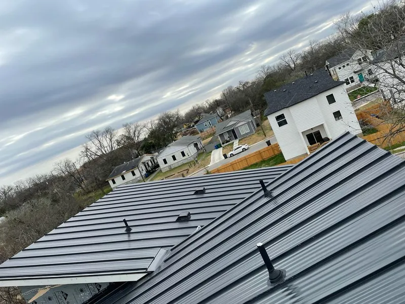 Standing seam metal roof panels with vents for Skylight Repair in Edgewater Park
